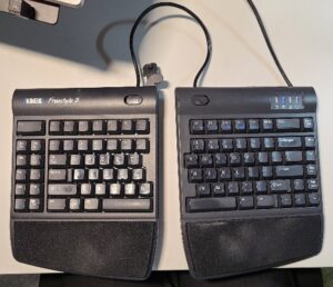 A picture containing keyboard, computer, indoor, desk Description automatically generated