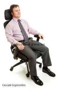 A person sitting in a chair Description automatically generated with medium confidence